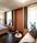 Der Schlafbereich der Suite Garmisch 1936 mit Doppelbett und Couch