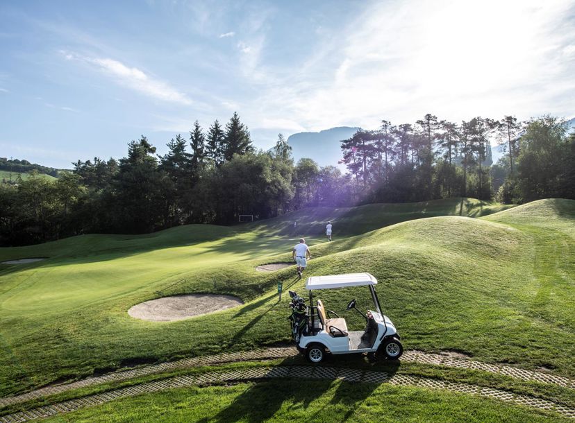 Two people on a golf course